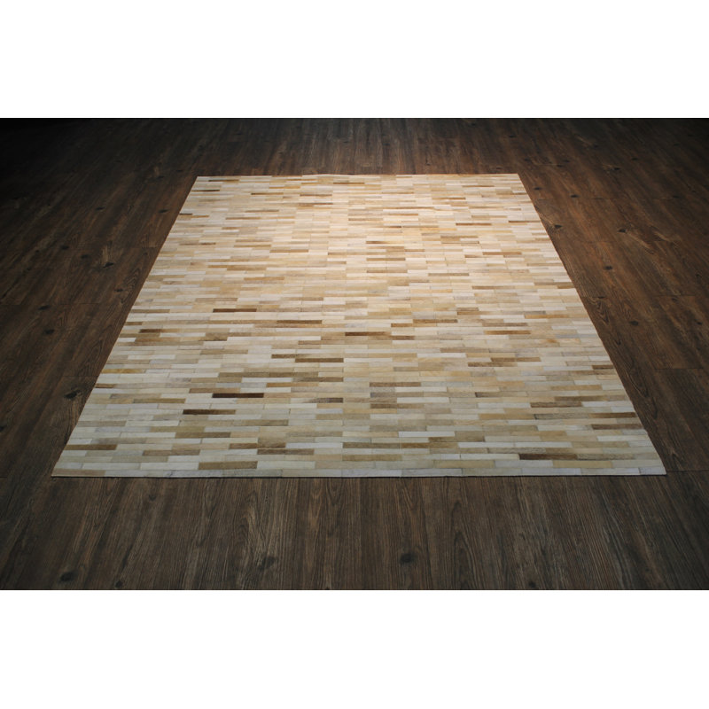 Tapis zone beige fait main Petillo