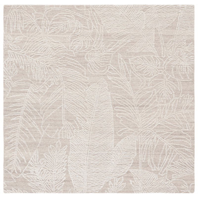 Ballari Hand Tufted Wool/Cotton Floral Rug in Ivory/Beige