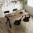Table brune avec chaises noires / dorées est en rupture de stock