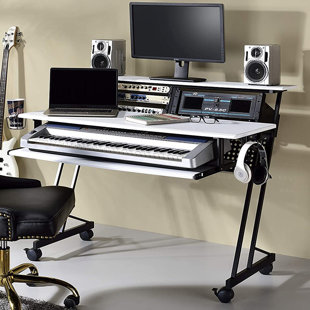 https://assets.wfcdn.com/im/88585913/resize-h310-w310%5Ecompr-r85/1844/184460395/exiquio-music-studio-producer-recording-piano-stand-desk-unique-smart-design-workstation-table-carbon-fiber-texture.jpg