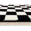 Tapis noir à motif géométrique Carpenter-31014191