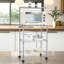 Support pour four à micro-ondes à quatre niveaux à roulettes réglables en hauteur, roulettes pour la mobilité, fabrication robuste en fil métallique, rangement polyvalent, conception peu encombrante