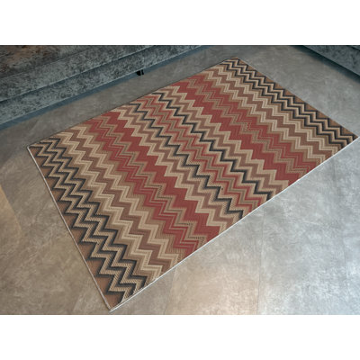 Tapis décoratif moderne multicolore à motif géométrique en zigzag foncé