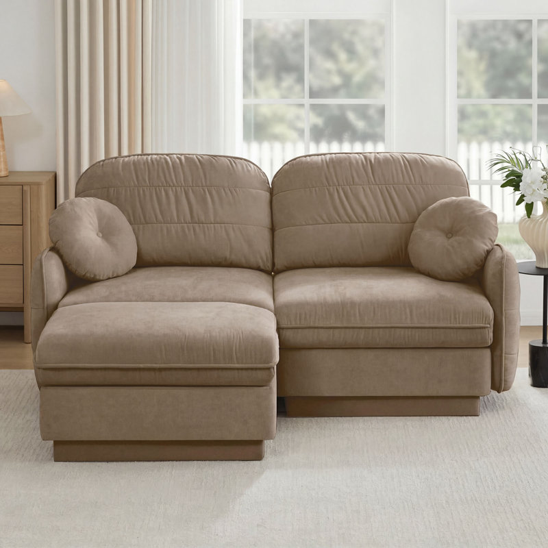 Canapé modulaire rembourré en L de 73 po avec repose-pieds mobile, 2 coussins ronds et une base encastrée