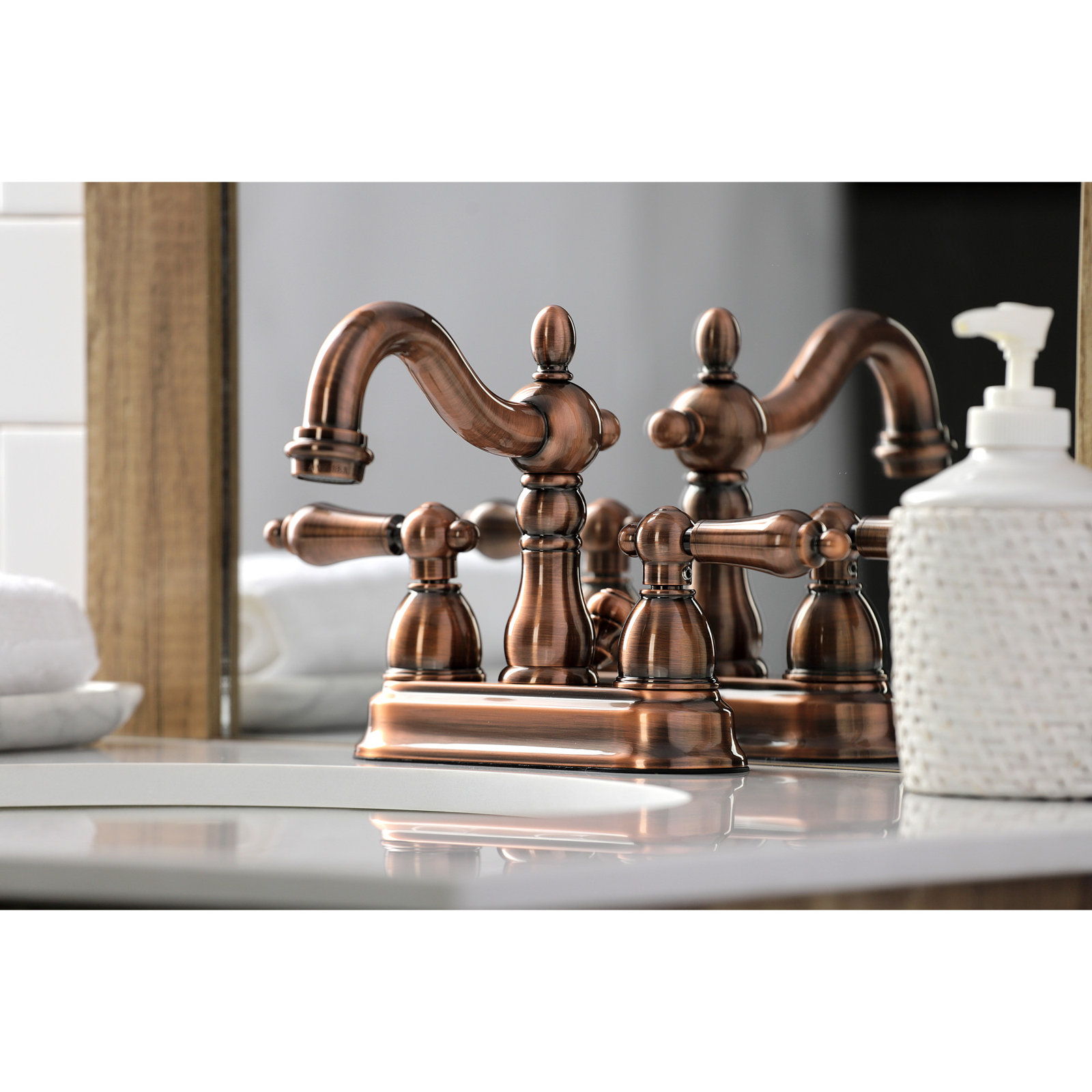 Kingston Brass Heritage Two-Handle 3-Hole Deck Mount 4" Centerset Bathroom Faucet with Plastic Pop-Up, Antique Copper