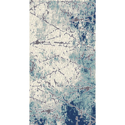 Tapis crème / bleu à motif abstrait touffeté