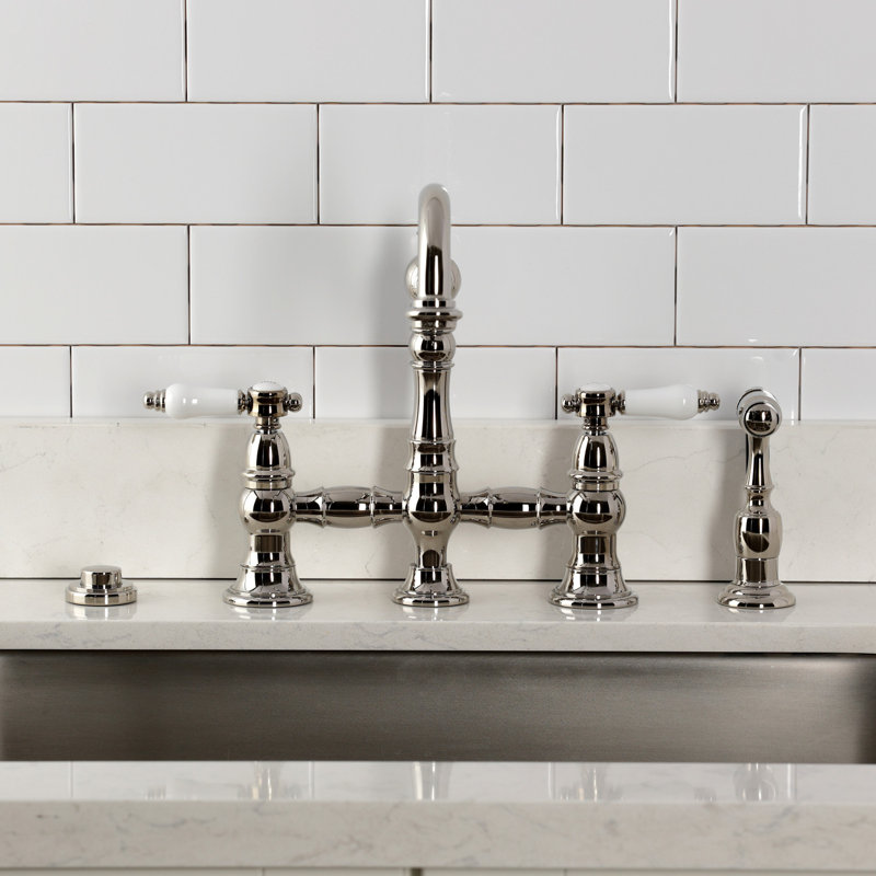 Kingston Brass Bel-Air Two-Handle 4-Hole Deck Mount Bridge Kitchen Faucet With Brass Side Sprayer, Polished Nickel