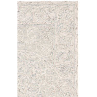 Lounette Hand Tufted Wool Cotton Floral Rug in Light Blue/Beige