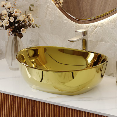 Lavabo vasque ovale doré, bol de salle de bain en céramique polie, conception moderne au-dessus du comptoir