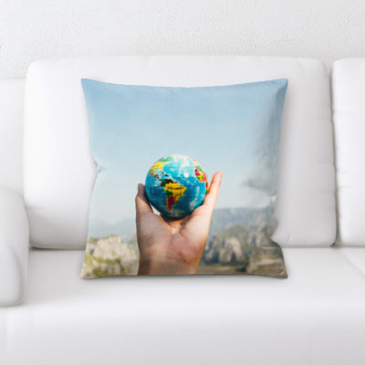 Holding a Globe Throw Pillow