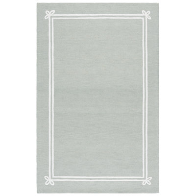 Laine touffetée à la main Martha Stewart; Tapis intérieur / extérieur en coton de couleur unie