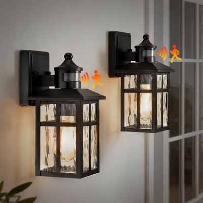 1-light 12 In. H Matte Black Motion Sensing Outdoor Wall Sconce With Dusk To Dawn
