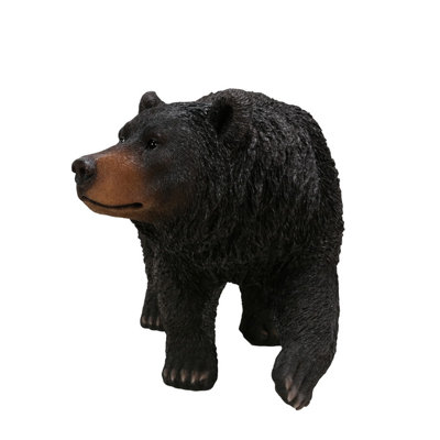 Statue ours noir qui marche