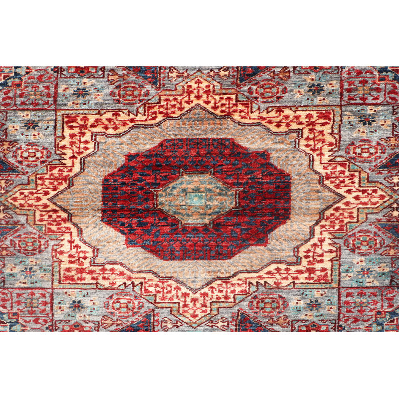 Tapis géométrique en laine noué à la main vert clair / rouge