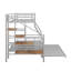 Lit simple superposé au dessus d'un lit double en métal avec lit gigogne-329151728