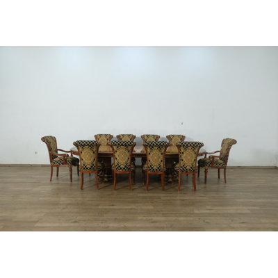 Ensemble de salle à manger 11 pièces avec chaise en or noir Manfro