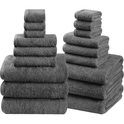 Ensemble de 18 serviettes de bain en coton avec boucles de suspension, gris. Parfait pour les salles de bain familiales, les salles de bain pour invités, les maisons avec plusieurs salles de bain et pour une rotation régulière. Certifié OEKO-TEX, facile d'entretien.