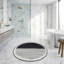 Tapis de bain rond à rayures abstraites