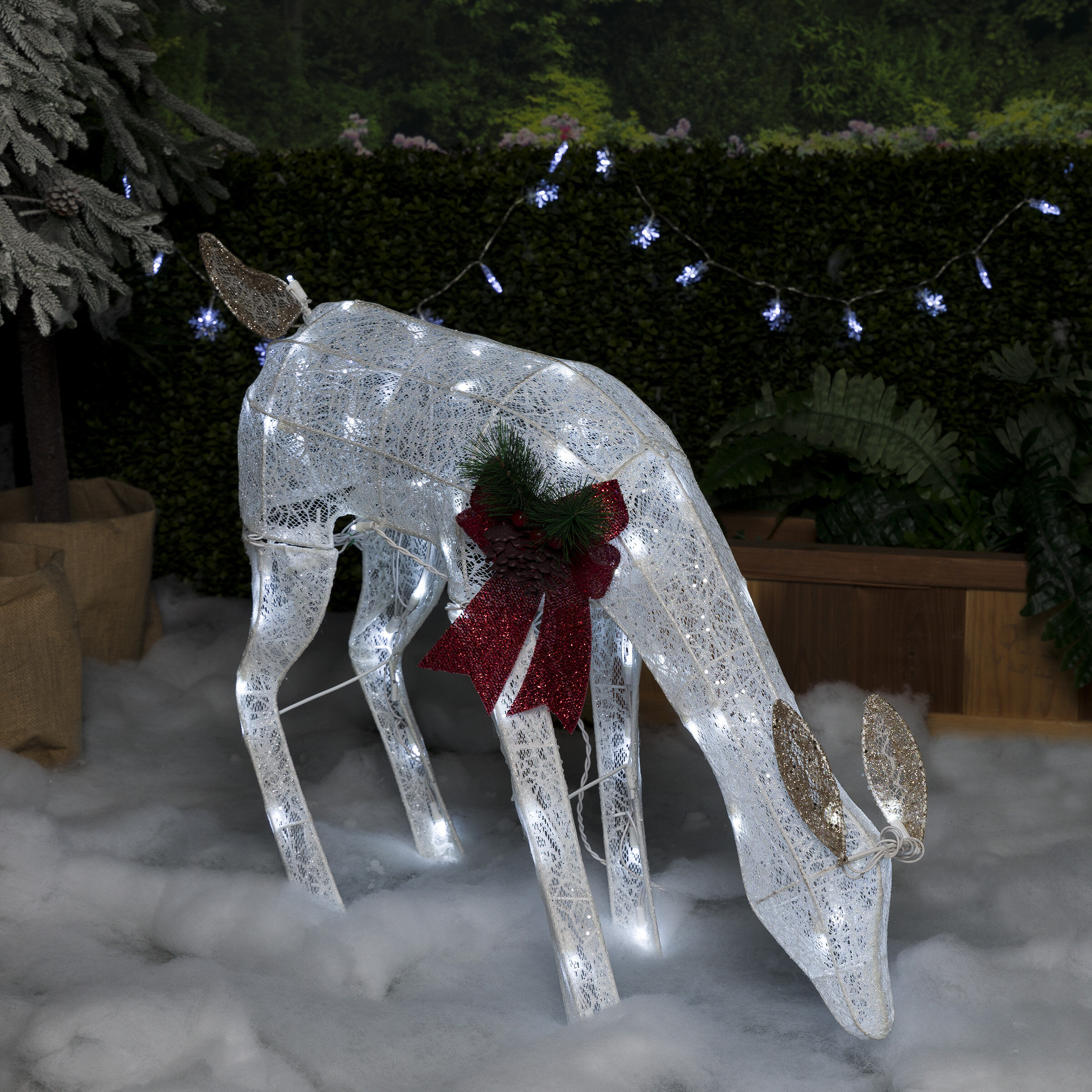 https://assets.wfcdn.com/im/88676358/compr-r85/1704/170469388/mesh-holiday-reindeer-lawn-decoration-with-cool-white-lights.jpg