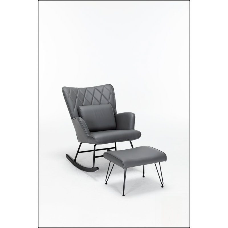 Fauteuil à bascule confortable à dossier haut pour chambre d'enfant, idéal pour la détente et les moments de complicité parent-enfant.