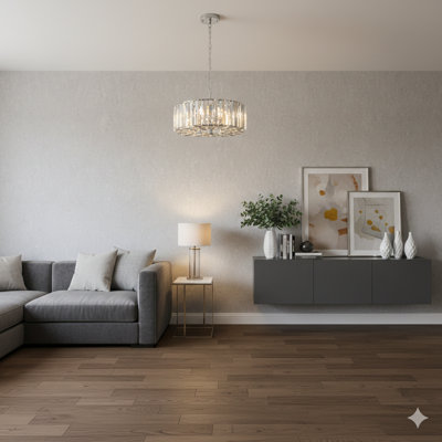 A 17-Inch Chrome And Crystal Pendant Chandelier. This Modern Hanging Light Fixture Features Adjustable Height And Four E26 Bulb Sockets, Suitable For Living Rooms, Dining Rooms, Or Kitchens (Bulbs Are Not Included).