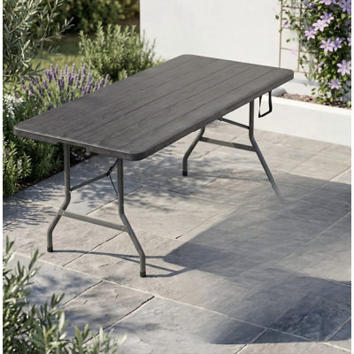 Table pliante portative épaisse de 6 pieds avec structure en acier robuste pour une capacité de charge stable et une poignée intégrée, adaptée à diverses occasions telles que les événements, les repas et les activités de plein air.
