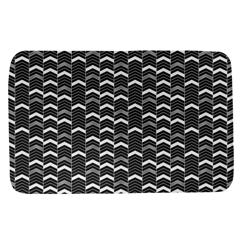 Tapis pour salle de bain lineed chevrons Stephenie, l 17 po x L 24 po, Noir / Ivoire
