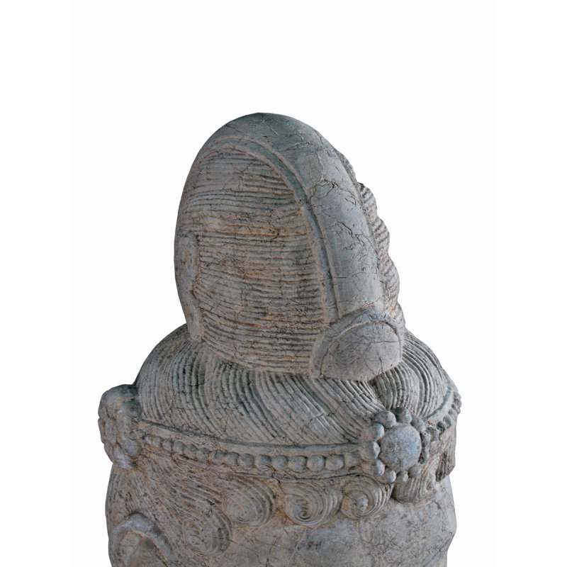 A Stone Statue Of Guanyin Head