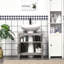 Rangement de salle de bain gris avec 2 portes et une tablette ouverte