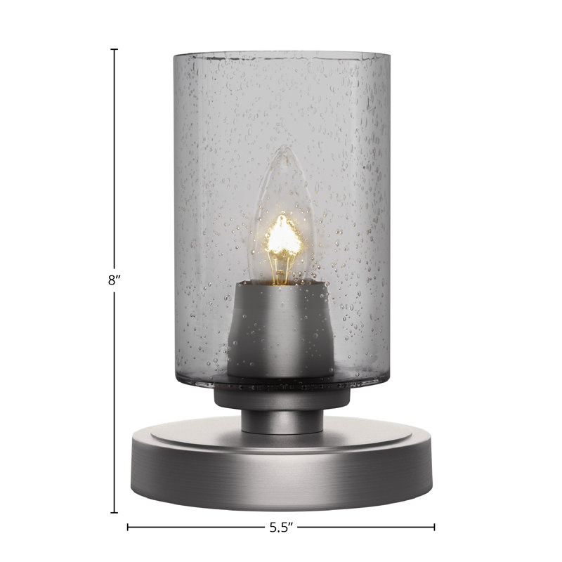 Lampe d'appoint Ceron présentée en finition graphite avec verre à bulles transparent de 4 po