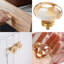 Paquet de 8 boutons d'armoire en cristal champagne, boutons d'armoire en verre doré pour tiroirs de commode, quincaillerie de meuble en laiton (ovale)