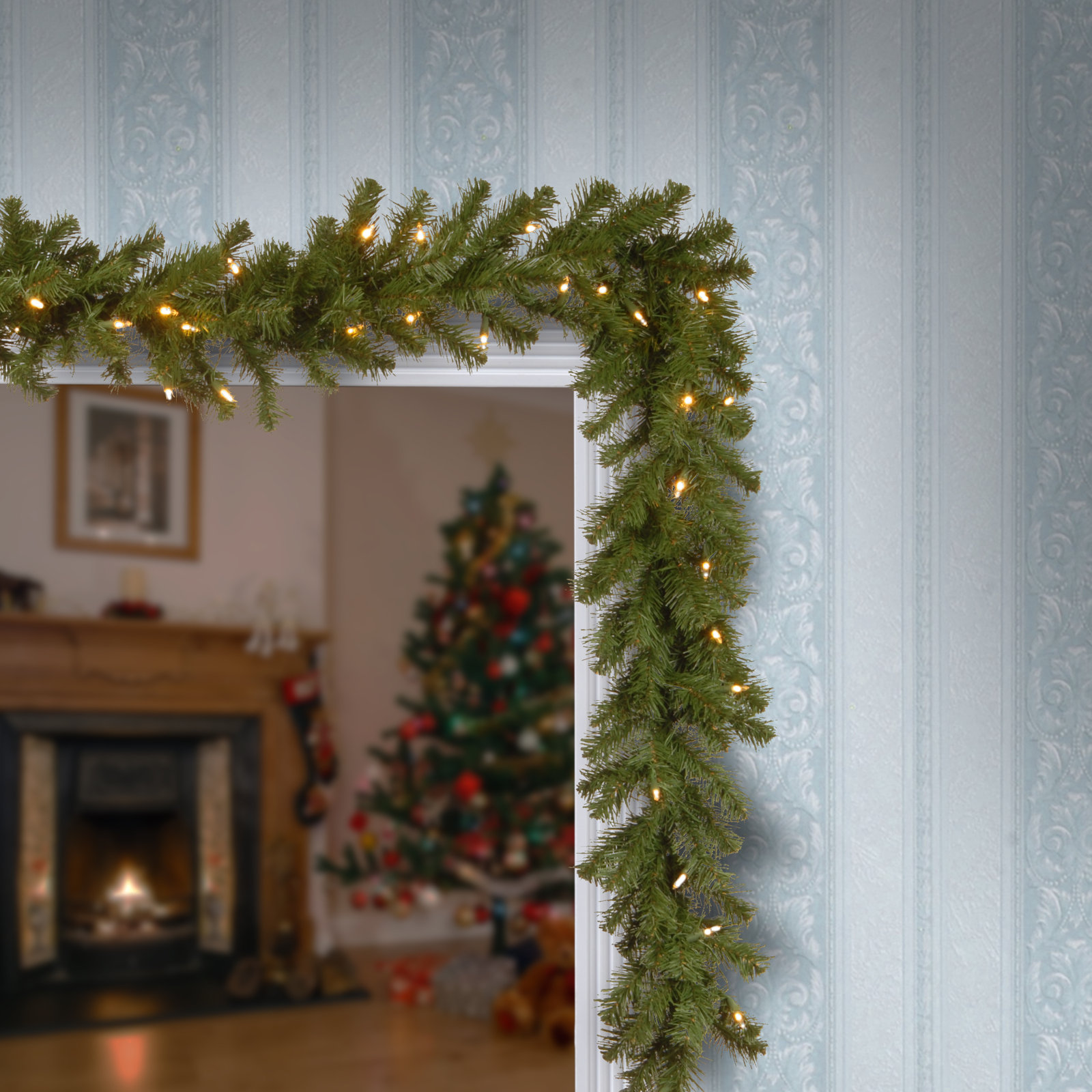 The Holiday Aisle® 9ft. North Valley Spruce Garland with Dual Color LED Lights