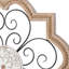 Décoration murale à volutes en bois brun sculpté