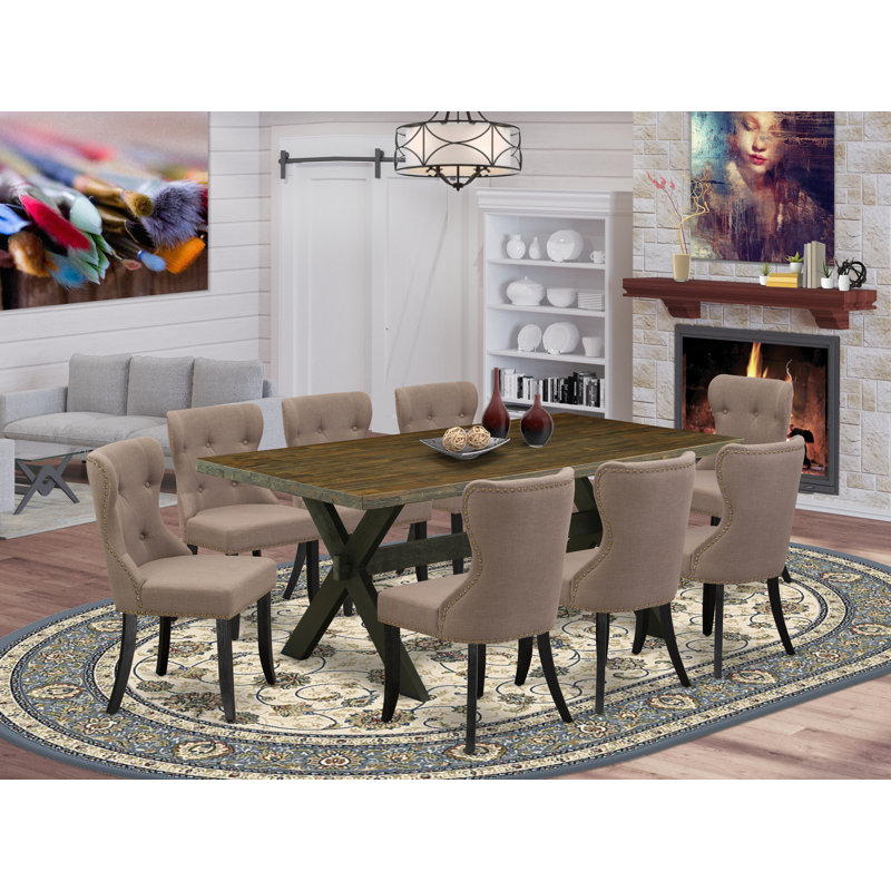 L'ensemble 9 pièces de table et chaises de cuisine comprend une table de salle à manger rectangulaire avec pieds en X et 8 chaises de salle à manger Parson en tissu de lin, finition noire brossée