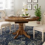 Judique Extendable Round Solid Wood Dining Table