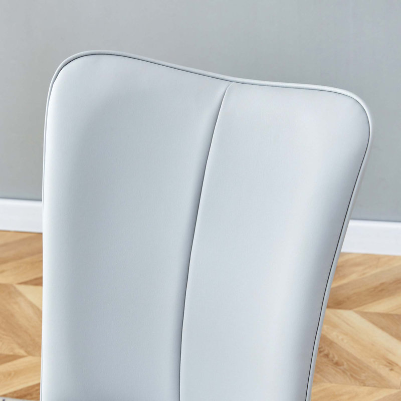 Ensemble de table et de chaises. Ensemble de salle à manger en MDF à motif marbré moderne - 55 po x 31,4 po avec chaises en polyuréthane avec un motif à rayures verticales sur le dossier. Convient pour la cuisine, la salle à manger, etc.