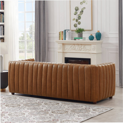 Sofa With Premium Cognac Leather Upholstery, Offering Timeless Elegance, Superior Comfort, And Durable Craftsmanship For Modern Living Spaces.