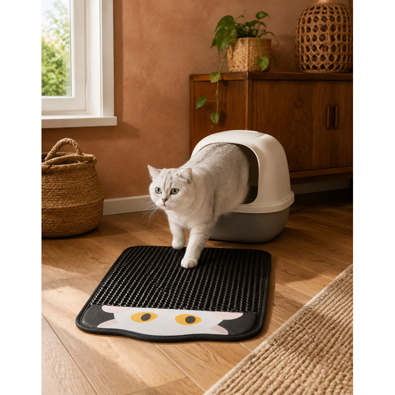 Un beau tapis de litière double couche conçu pour être utilisé avec n'importe quelle litière pour chat.