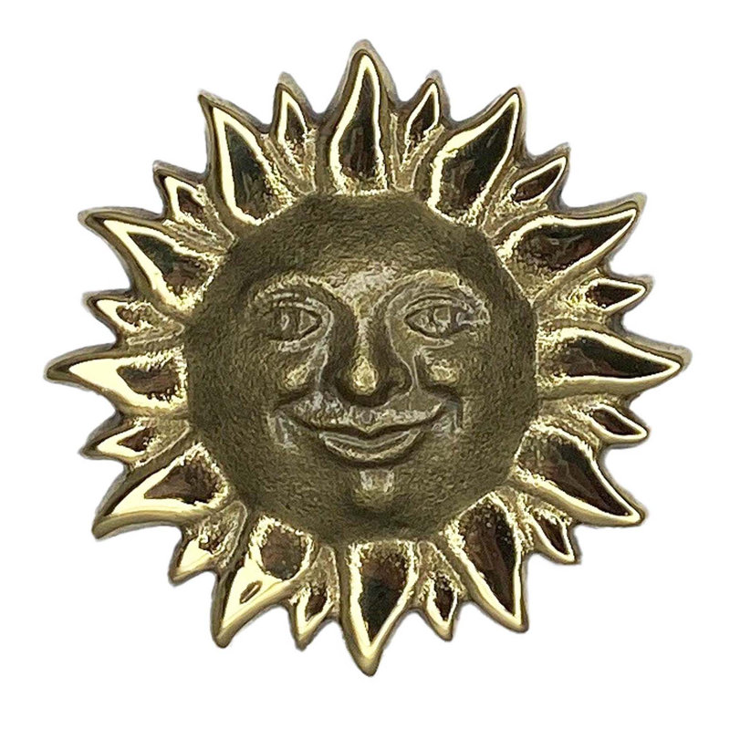Bouton-poussoir souriant, Laiton
