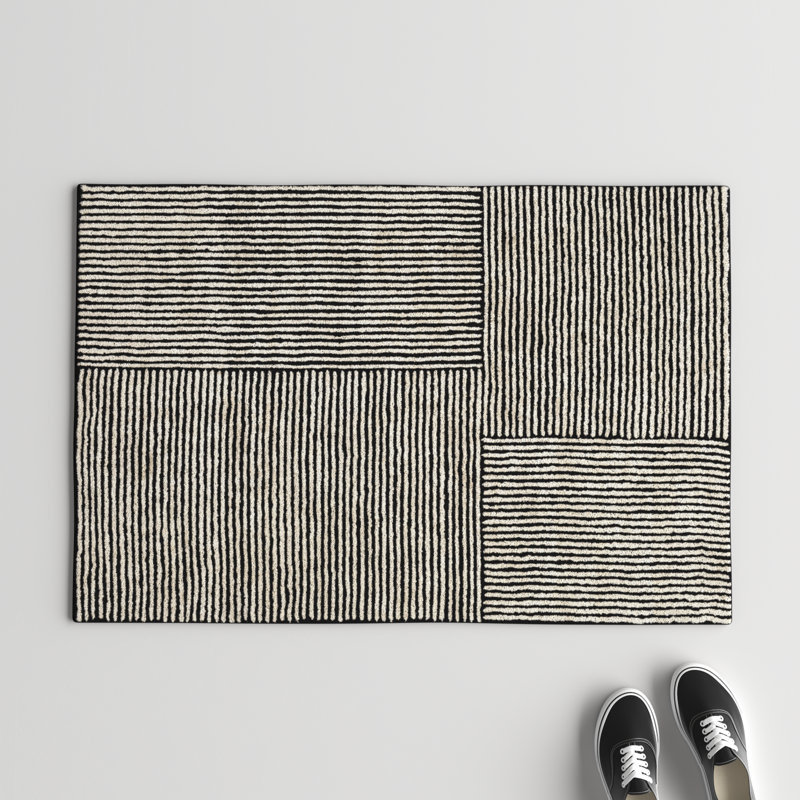 Balos Hand Tufted Black/Ivory Rug, Rectangle 2' x 3'