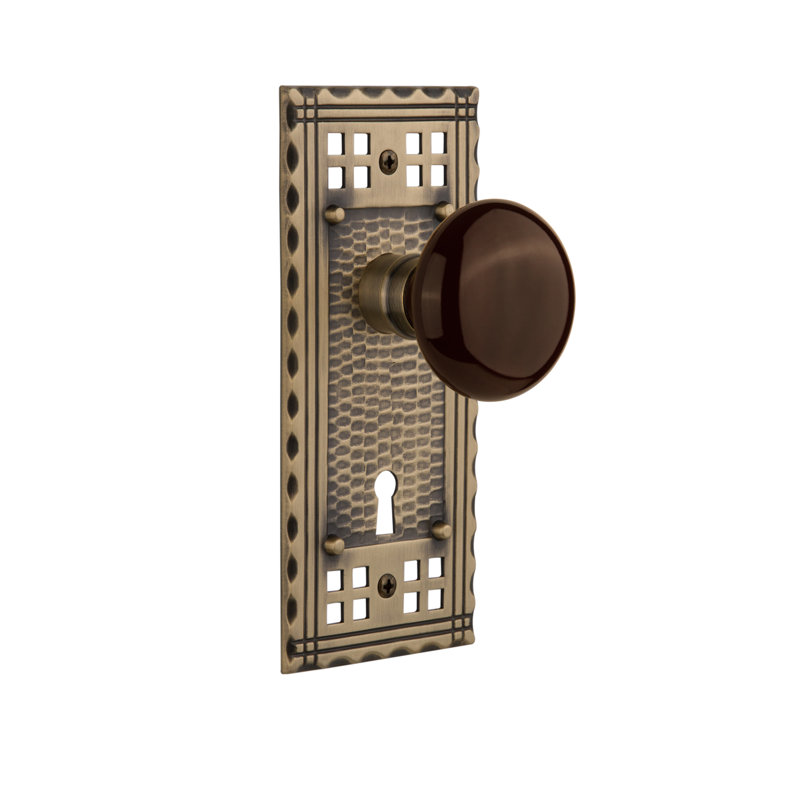 Craftsman Plate with Decorative Keyhole and Brown Porcelain Door Knob, 2-3/4”, Antique Brass