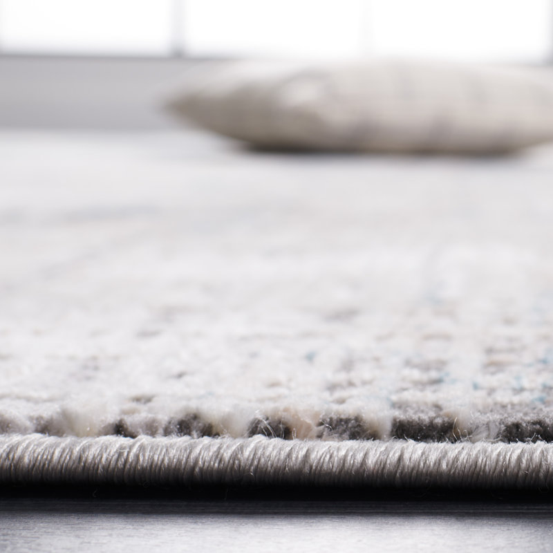Tapis bleu / gris Neuman Vogue 117, Rond 6 pi 7 po