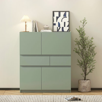 Armoire de rangement verte en bois avec 4 portes et 2 tiroirs