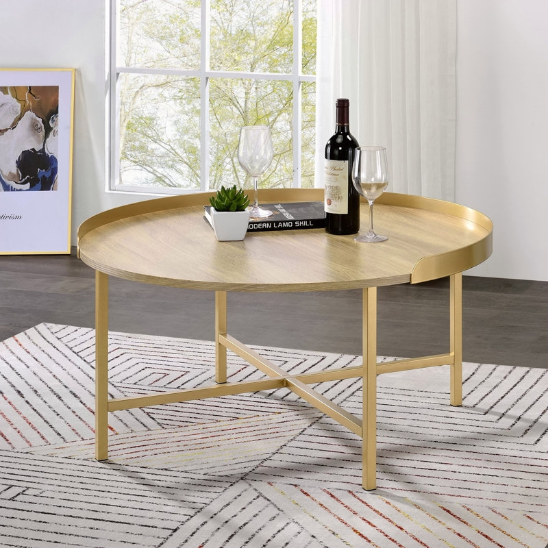 Table basse avec plateau en chêne et or