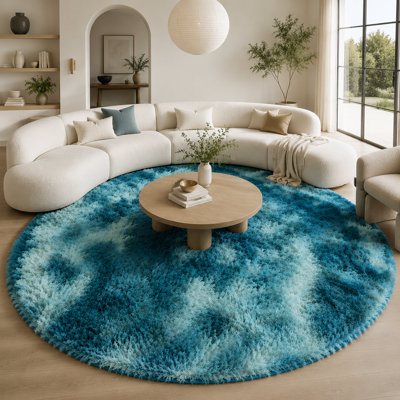 Tapis à poil long bleu doux à poils noués et teinté Ebern Designs