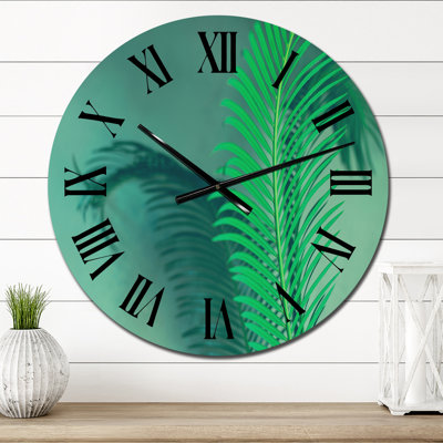Horloge murale - Feuilles de palmier vert vif sur fond vert foncé