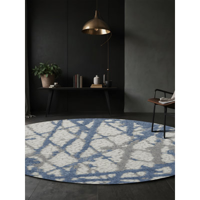 Tapis gris soyeux et moelleux