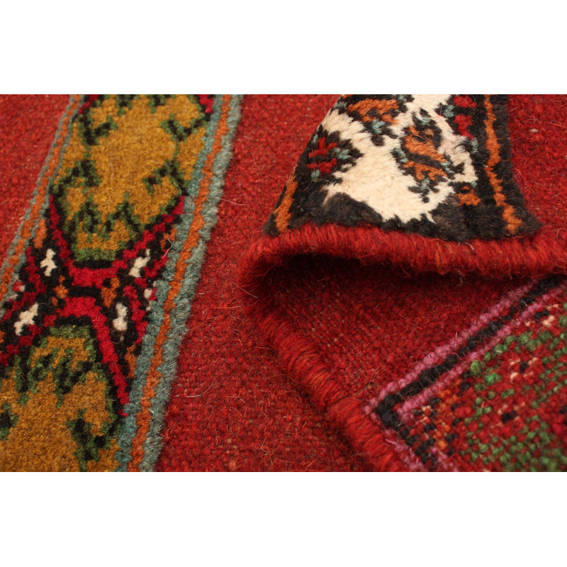 Tapis rouge en laine noué à la main