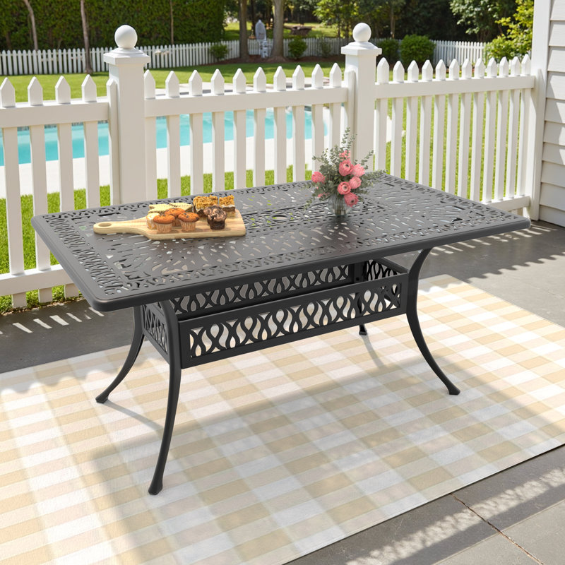 Shnorhali 58.27" L x 34.65" W Rectangular Cast Aluminum Patio Table with 1.88" Umbrella Hole