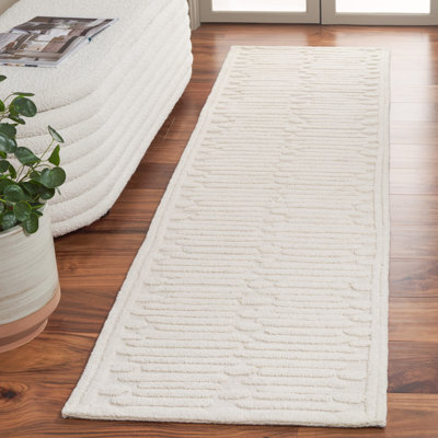 Tapis ivoire en laine / coton touffeté à la main Elona